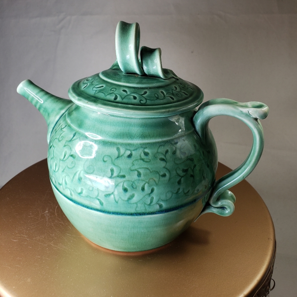 EUC- Handmade teapot in sage-colored glaze By Doris Waddell